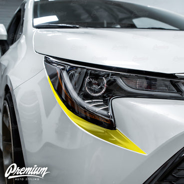 2019-2022 Toyota Corolla Hatchback Front Bumper Accent - Under Eyelid Overlay - Gloss Black | E210