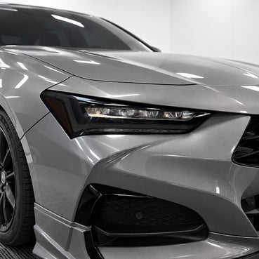 2021–2025 Acura TLX headlight with smoked tint covering the DRL and factory amber reflector areas