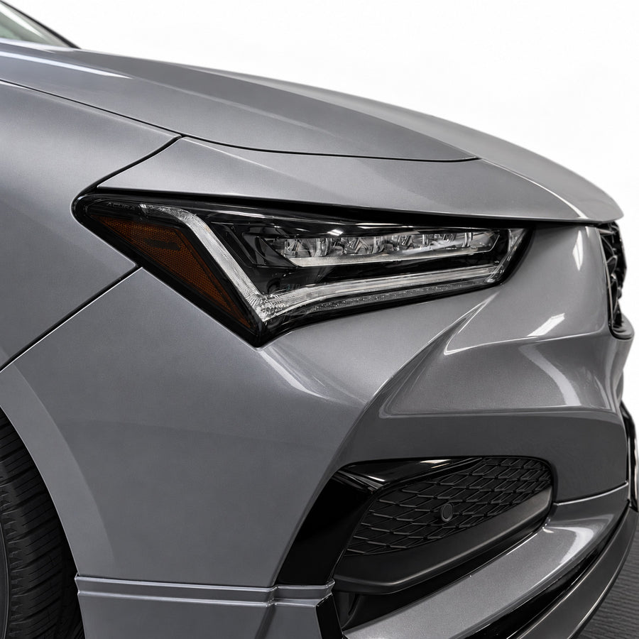 2021–2025 Acura TLX headlight amber reflector with smoked tint overlay installed