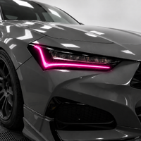 2021–2025 Acura TLX headlight with transparent pink DRL tint and gloss black amber-delete vinyl installed