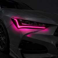 2021–2025 Acura TLX headlight with transparent pink DRL tint and gloss black amber-delete vinyl installed