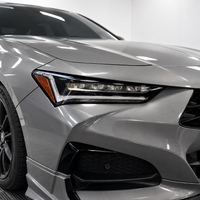 2021–2025 Acura TLX headlight with smoked tint covering the DRL and factory amber reflector areas