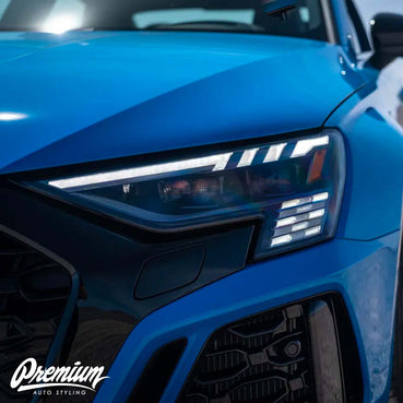 2022-2024 Audi RS3 Headlight Pre-Cut Protection Film on a blue Audi RS3 vehicle