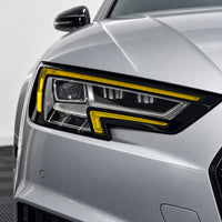 2017–2019 Audi A4 S4 B9 headlight with yellow DRL tint, gloss black eyelid, and side reflector coverage