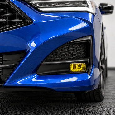 Pre-cut transparent yellow fog light tint overlay for the 2021–2025 Acura TLX