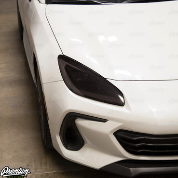 Mid-Smoke Tint Full Headlight Overlay - Shown on a Subaru BRZ (same external headlight shape)