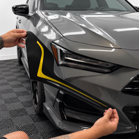2021–2025 Acura TLX headlights with yellow DRL tint and amber-delete vinyl overlays installed