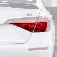 2022–2026 Honda Civic Si Sedan passenger taillight with transparent red tint overlays covering the clear insert sections.