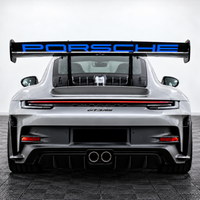 Porsche 911 GT3 RS 992 rear wing with OEM-style replica vinyl decal installed - RED lettering 