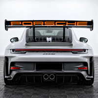 Porsche 911 GT3 RS 992 rear wing with OEM-style replica vinyl decal installed - RED lettering 