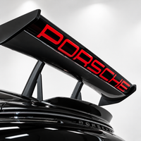 Porsche 911 GT3 RS 992 rear wing with OEM-style replica vinyl decal installed - RED lettering 