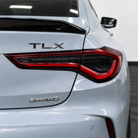 2021–2025 Acura TLX factory taillight with smoked vinyl tint overlays installed