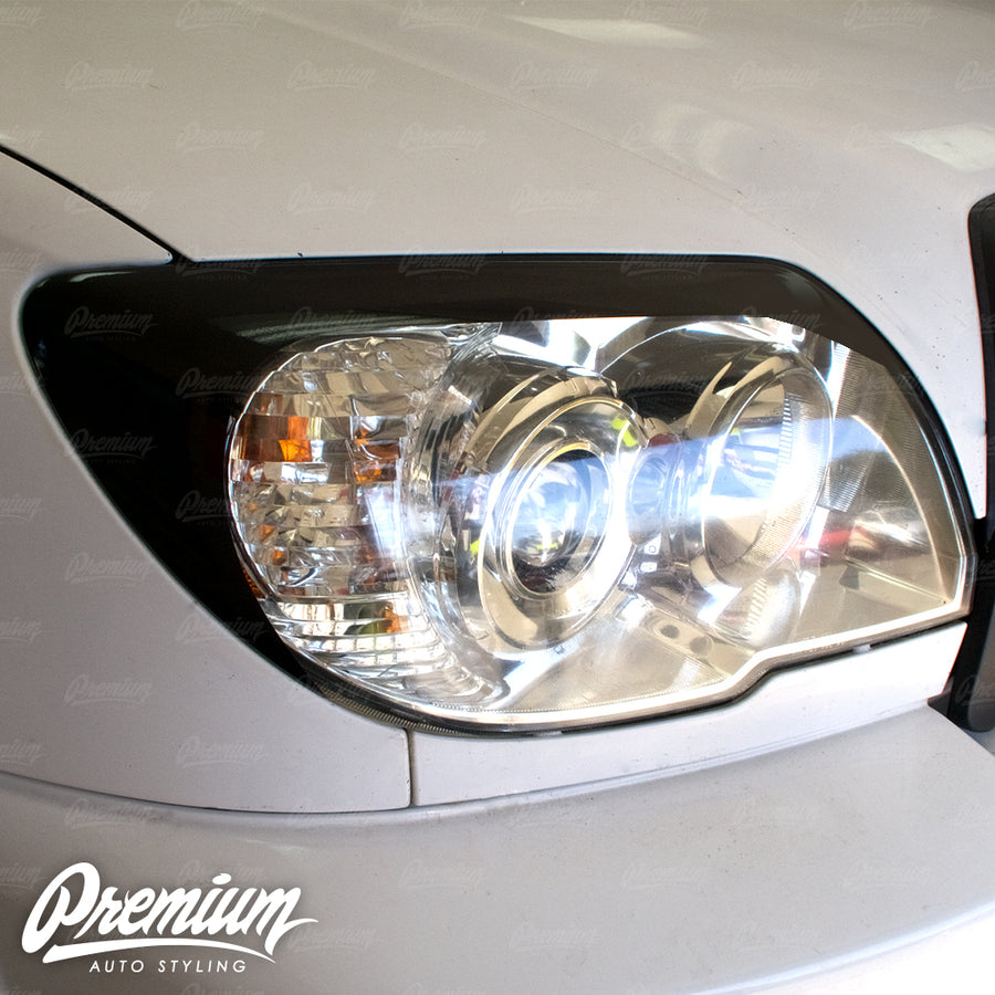 Headlight Amber Delete w/ Eyelid Vinyl Overlay V2 -Gloss Black | 2006-2009 Toyota 4Runner (4th Gen)